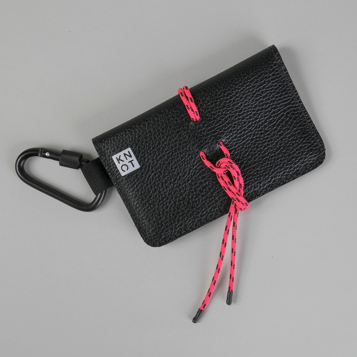 ROLLKNOT / Tabaquera cuerda / Negro / Fucsia Neón